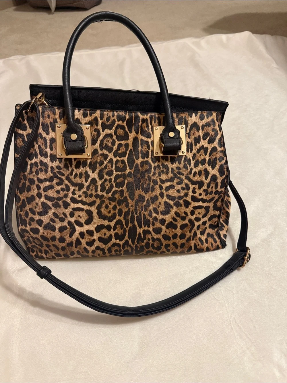 Leopard Print Tote Bag with Black Handles and Gold Hardware. The wallet included